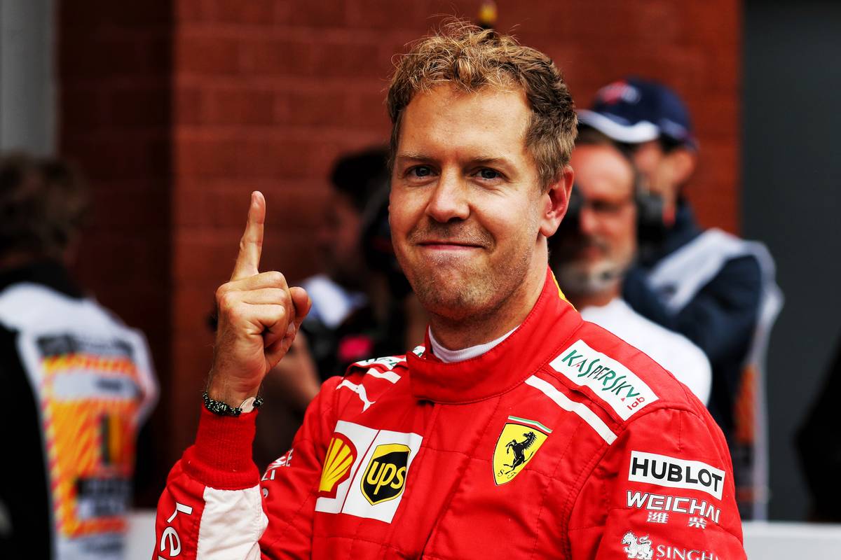 Belgian Grand Prix winner Sebastian Vettel (GER) Ferrari celebrates in parc ferme.