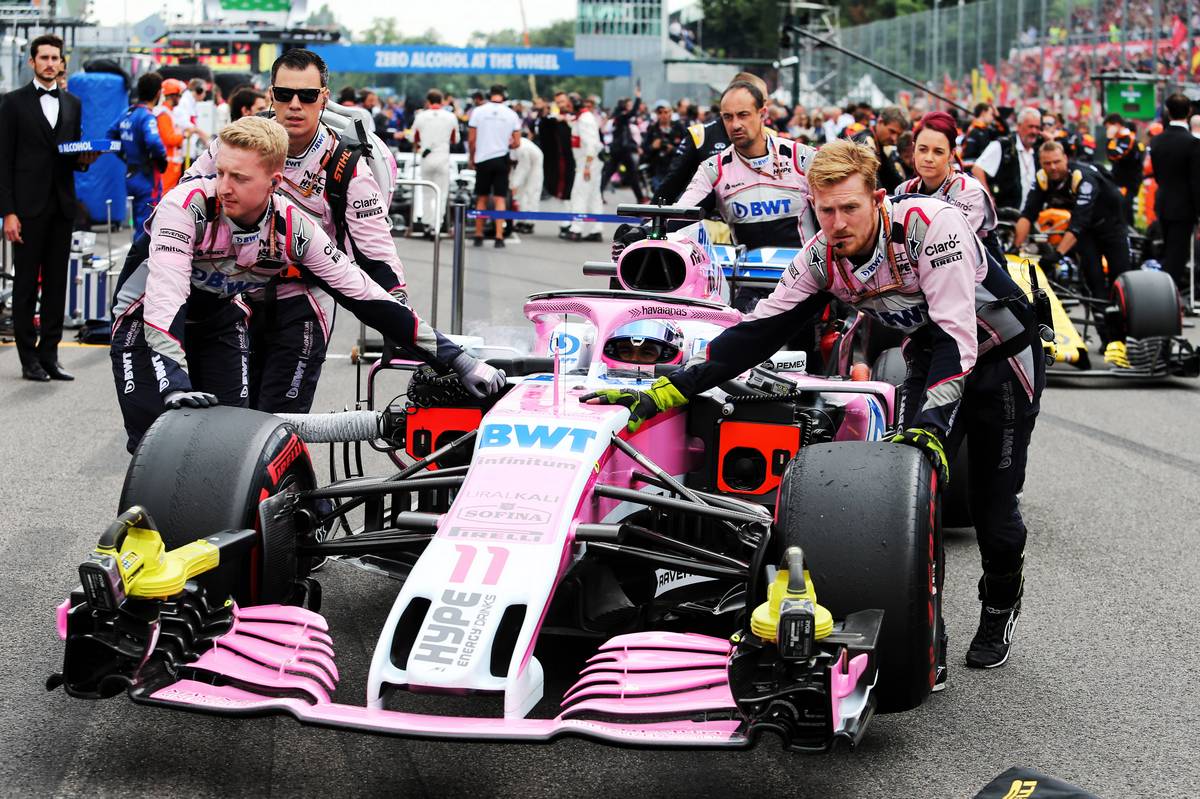Sergio Perez (MEX) Racing Point Force India F1 VJM11 on the grid.